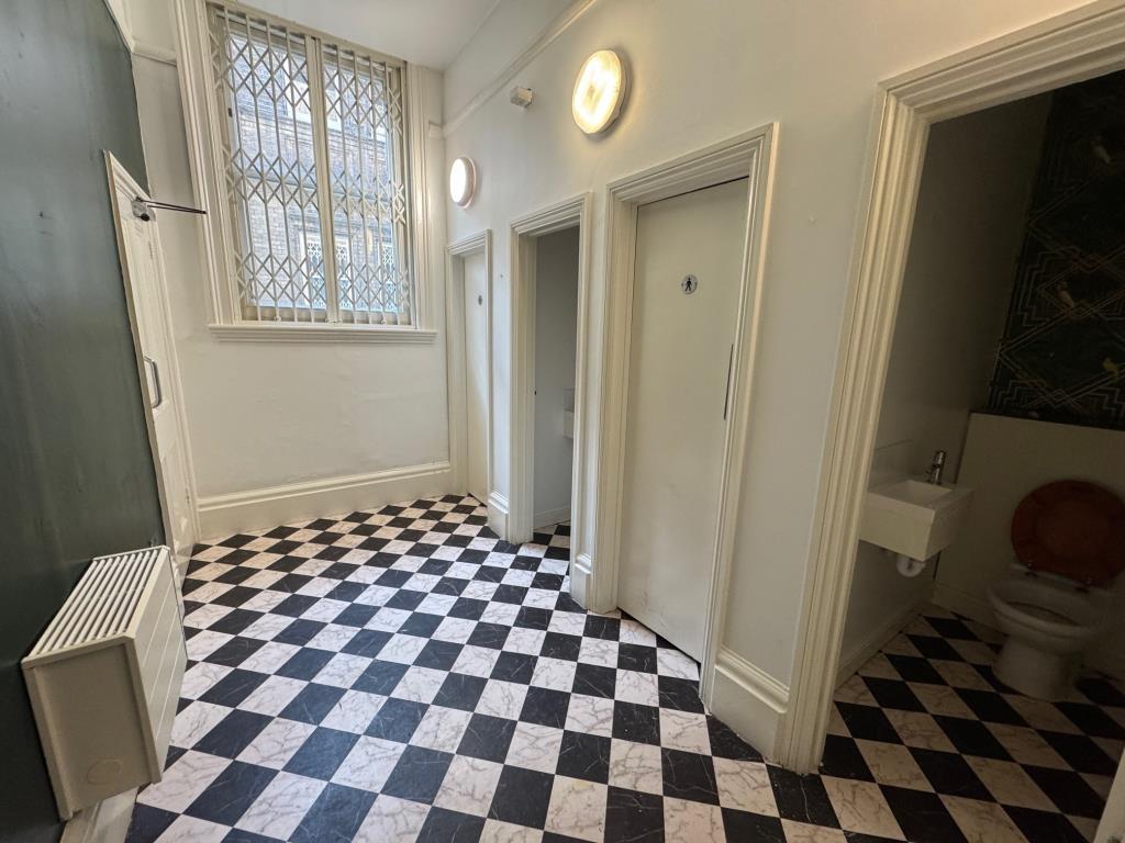 Lot: 112 - ICONIC & HISTORIC PERIOD HIGH STREET BUILDING WITH POTENTIAL - One of the toilets